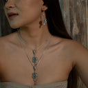 USHARI IN PERIDOT PENDANT