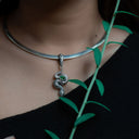 USHARI IN PERIDOT PENDANT
