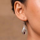 SWING WITHIN GARNET EARRING
