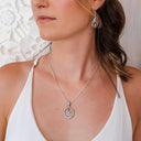 ENCIRCLE YOUR HEART IN ZIRCONIA PENDANT