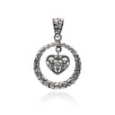 ENCIRCLE YOUR HEART IN TOPAZ PENDANT