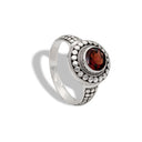 SUR'ROUND IN GARNET RING